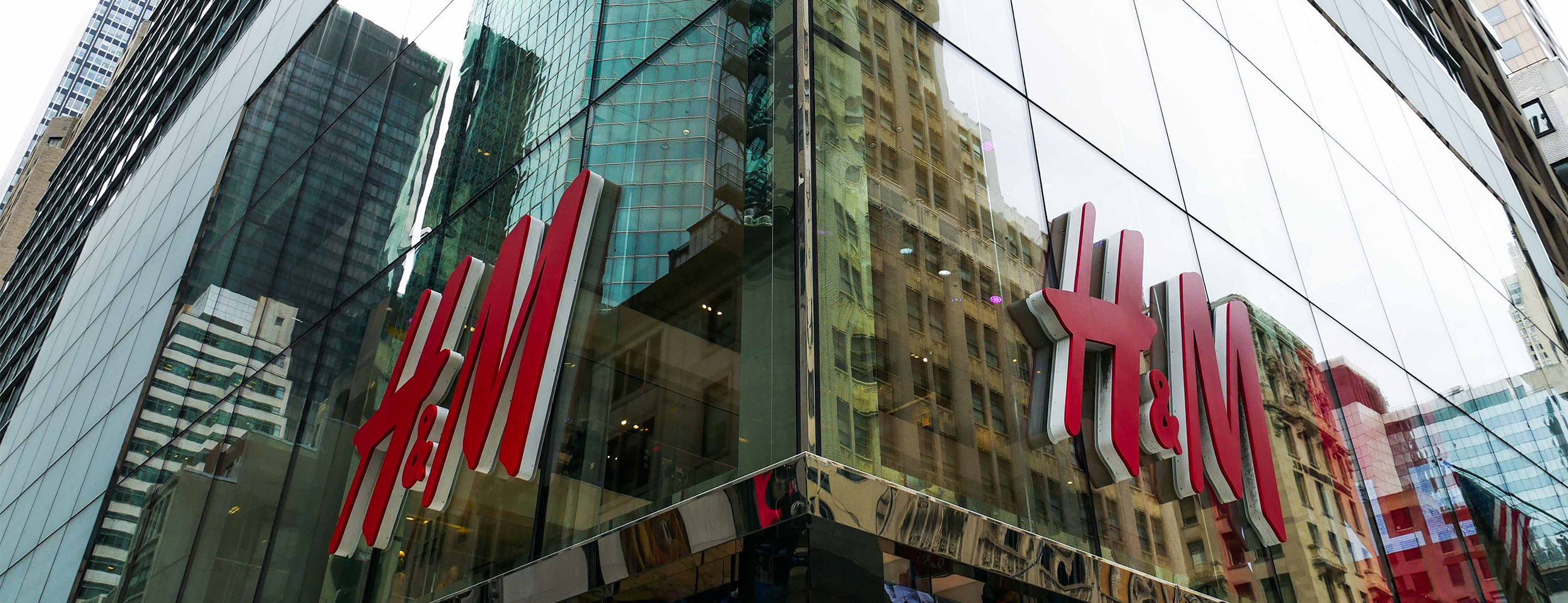 Close up of H&M signage, from outside of the store.