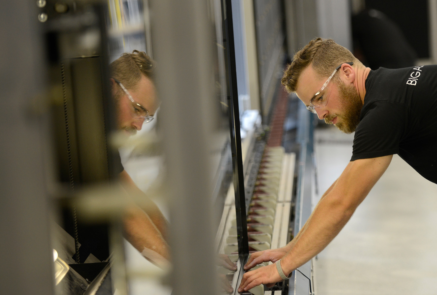 Plant Magazine looks at AGNORA's culture with employee Cody Kelly Operating the 130" x 300" insulating line